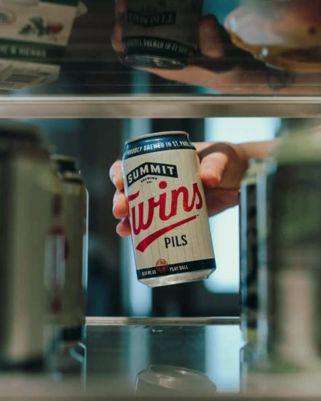 can being pulled from cooler